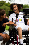 Young woman using a Tobii Dynavox assistive technology device to communicate